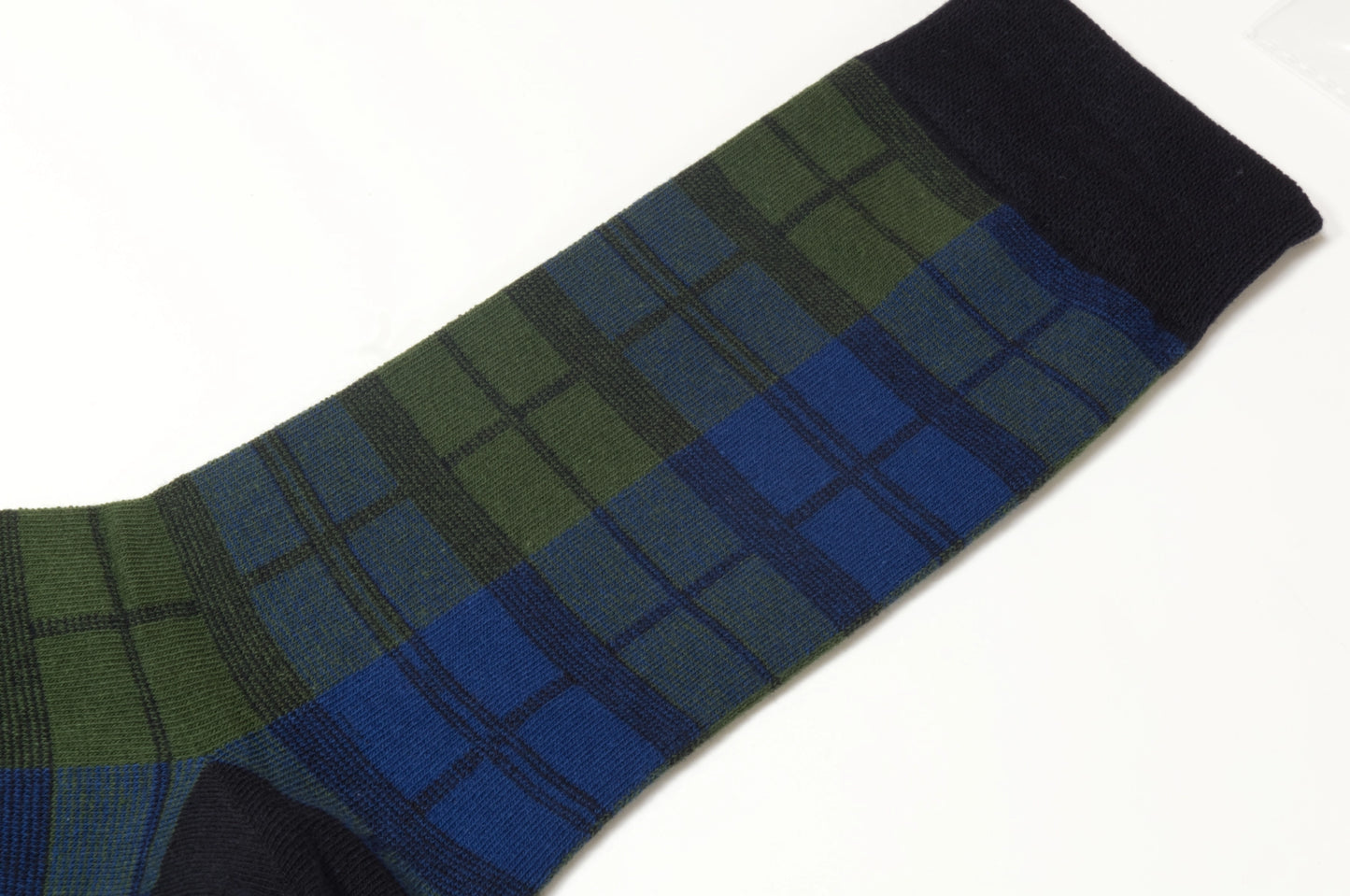 Close up Black watch tartan socks scotland gift plaid sock