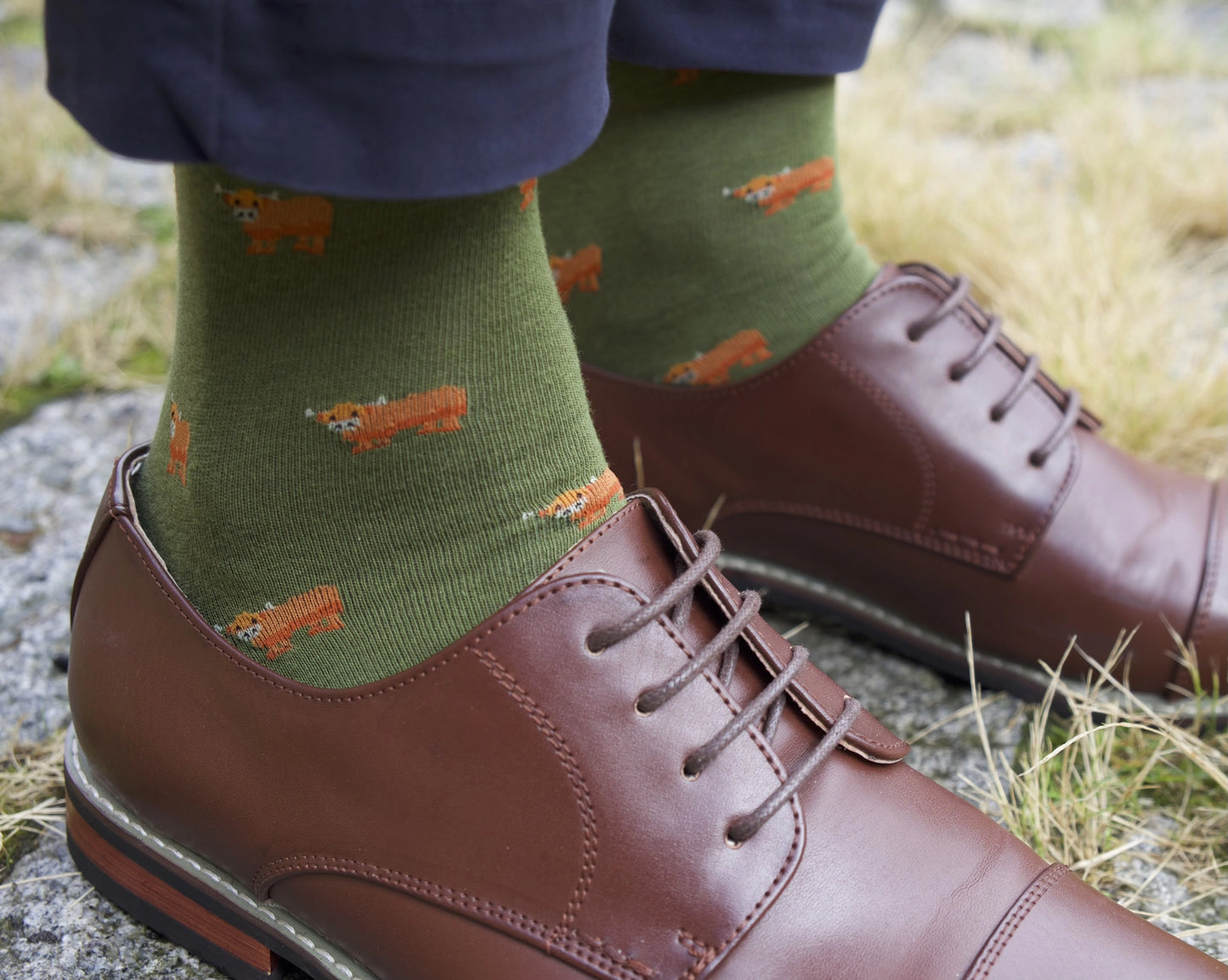 Highland Cow socks modelled on feet